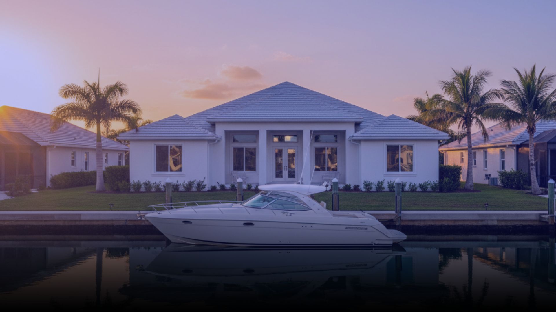Beautiful Tampa home exterior with clean roof and dock after professional pressure washin