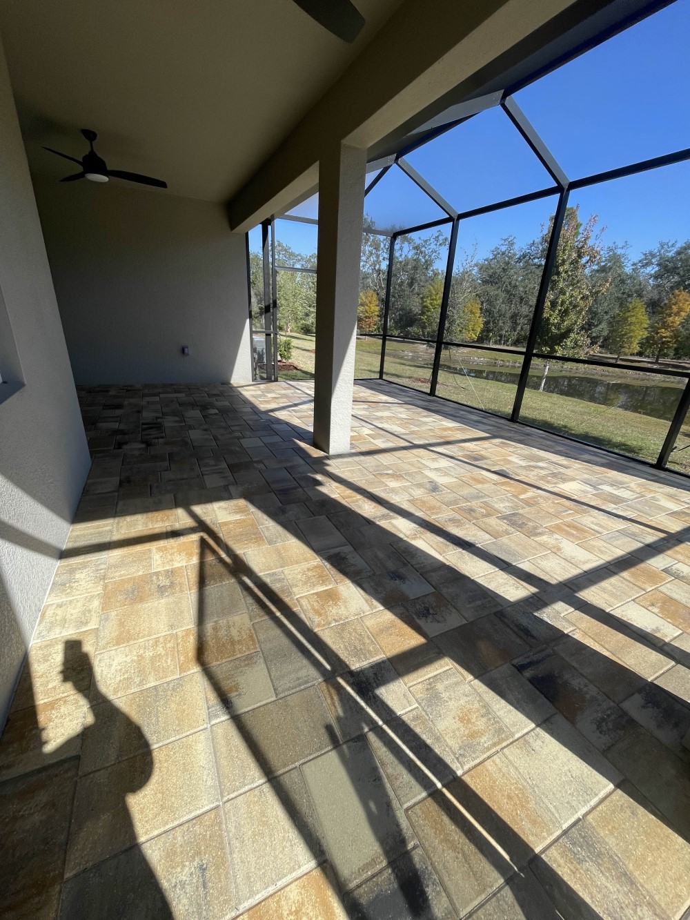 Cleaned and sealed patio pavers in Angeline community